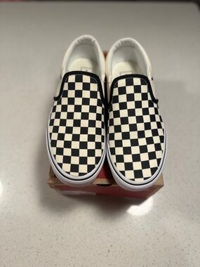 Vans Slip-On Sneakers - Black and White Checkerboard